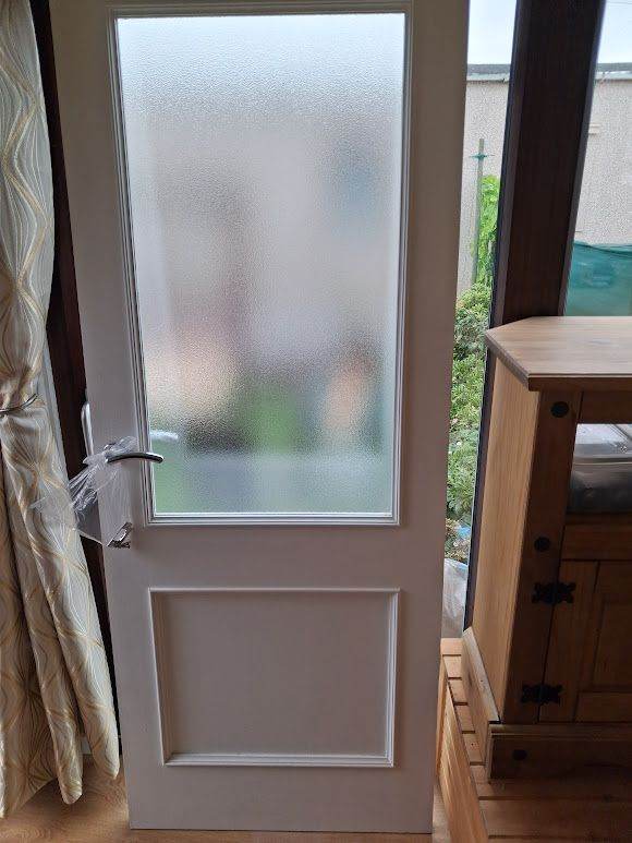 Door with frosted glass panel