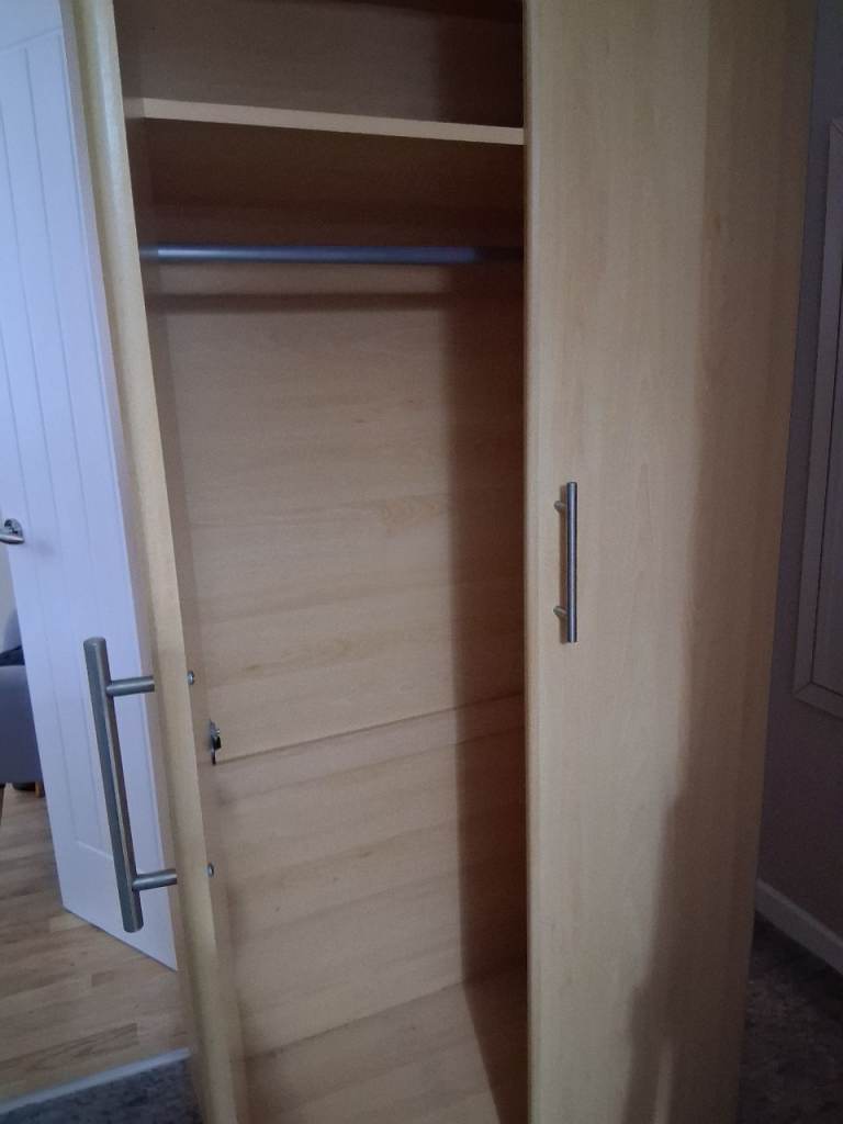 Beech wardrobe, chest if drawers and two bedside tables