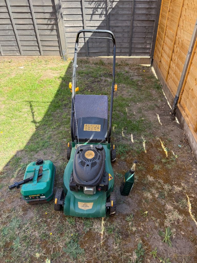 Petrol Lawn Mower with Fuel Can and Oil – Good Condition