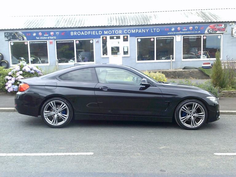 2015 15-reg BMW 420i Sport coupe 6 speed manual in black metallic