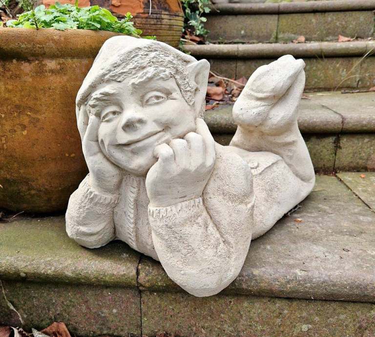 Large lying down pixie statue
