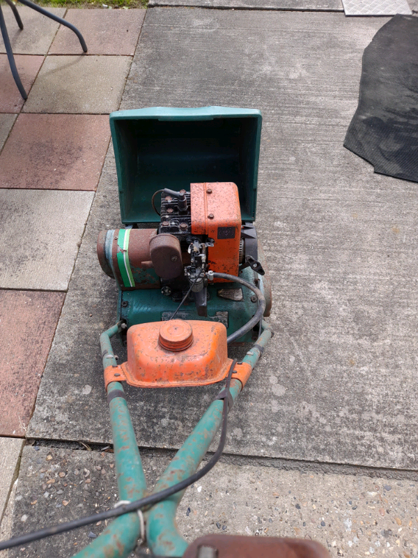Qualcast Petrol lawnmower.  12 inch