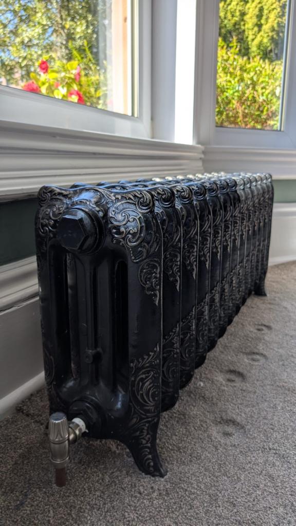 Five Black Cast Iron Radiators with Ornate Design