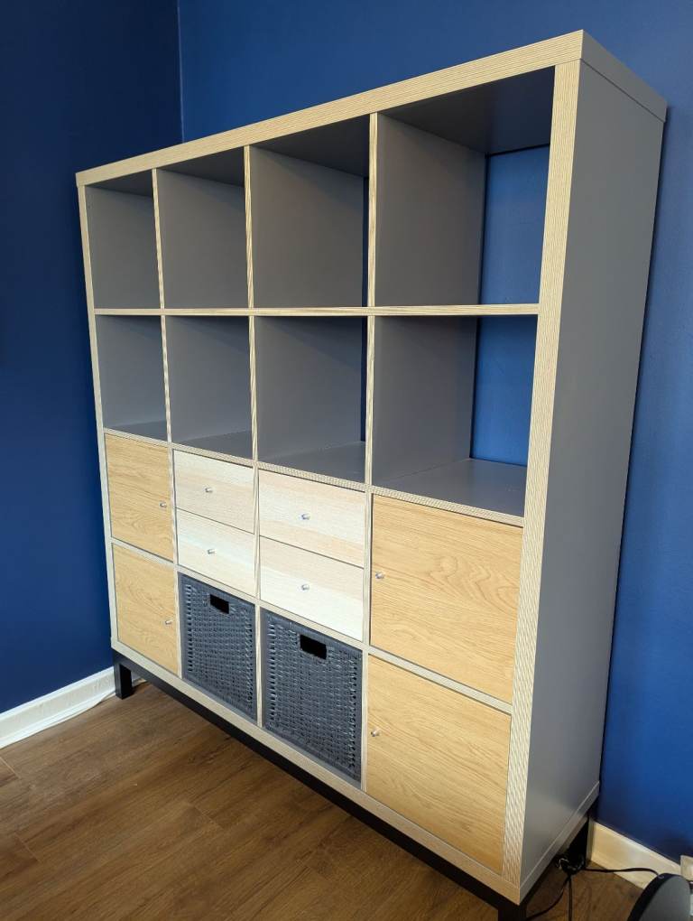 IKEA kallax storage system with drawers and cupboards