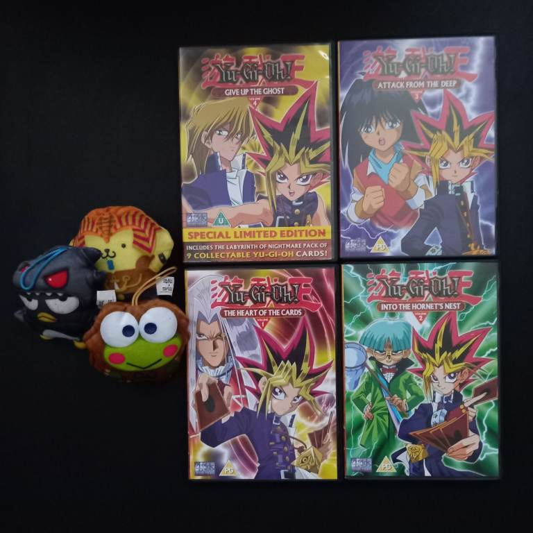 YU GI OH VOLUME 1-4 DVDS & COLLECTABLE PLUSHIES