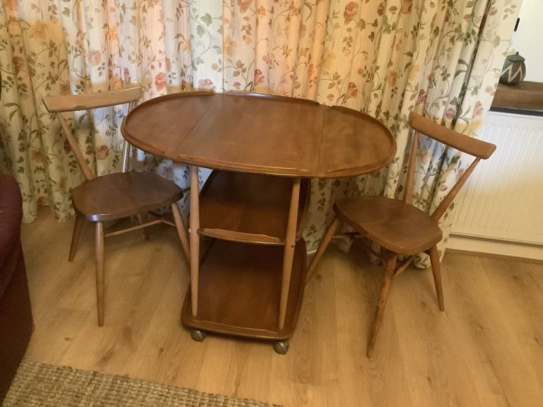 Ercol drop-leaf trolley and pair of chairs