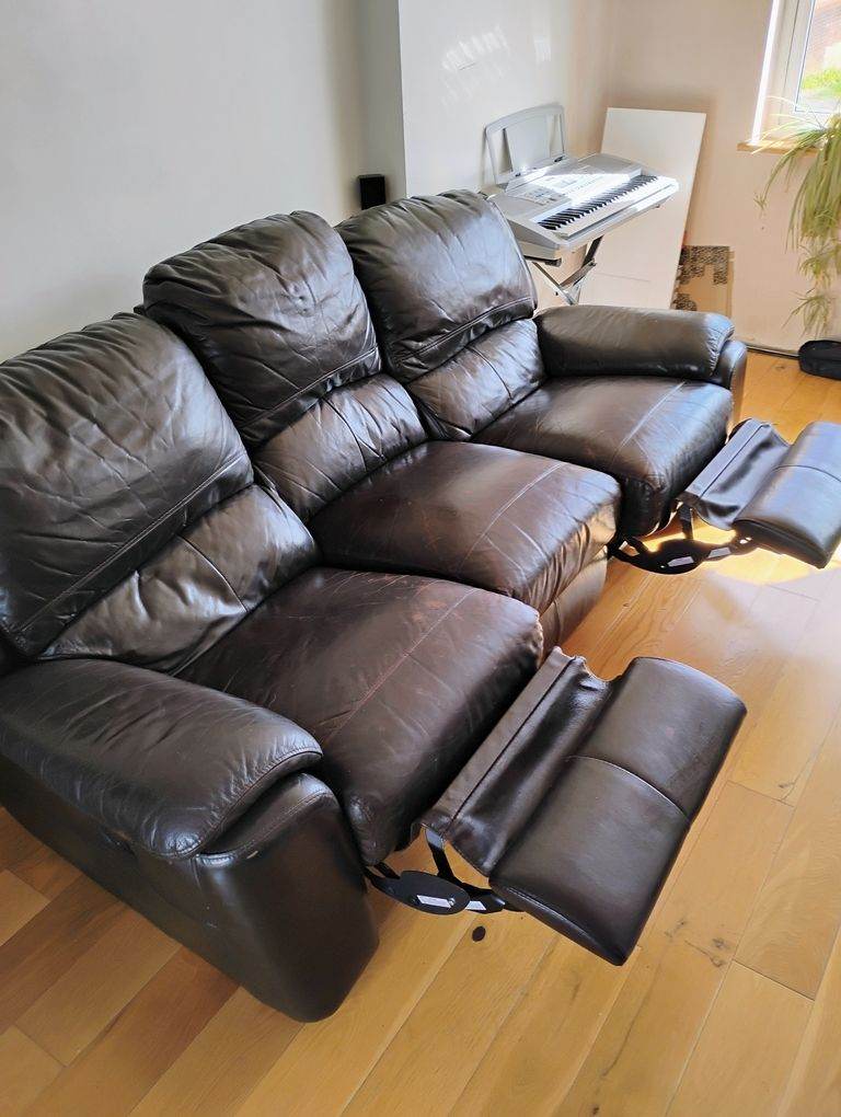 Three seater leather recliner sofa