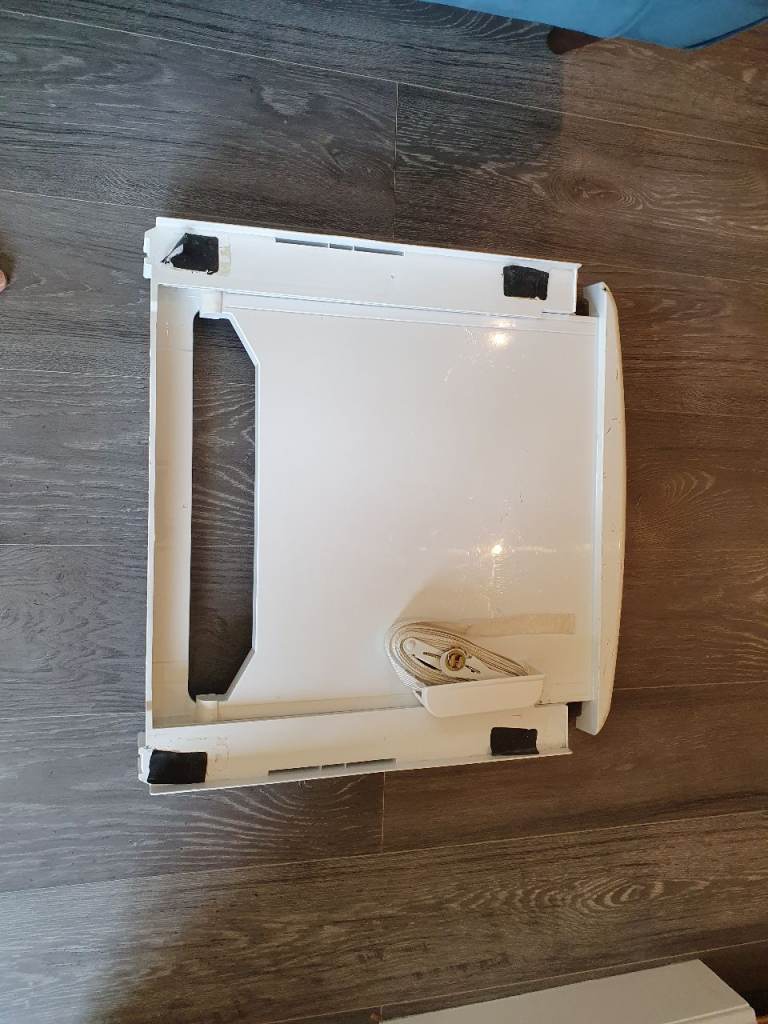 Universal stacker for washing machine/ tumble drier 