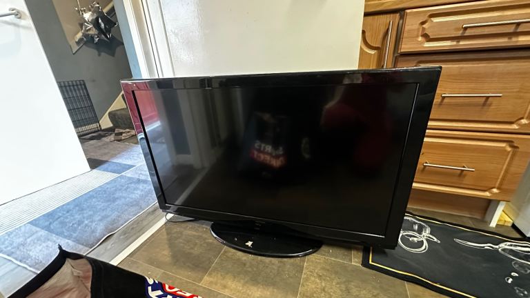 Black Flat Screen TV - Good Condition