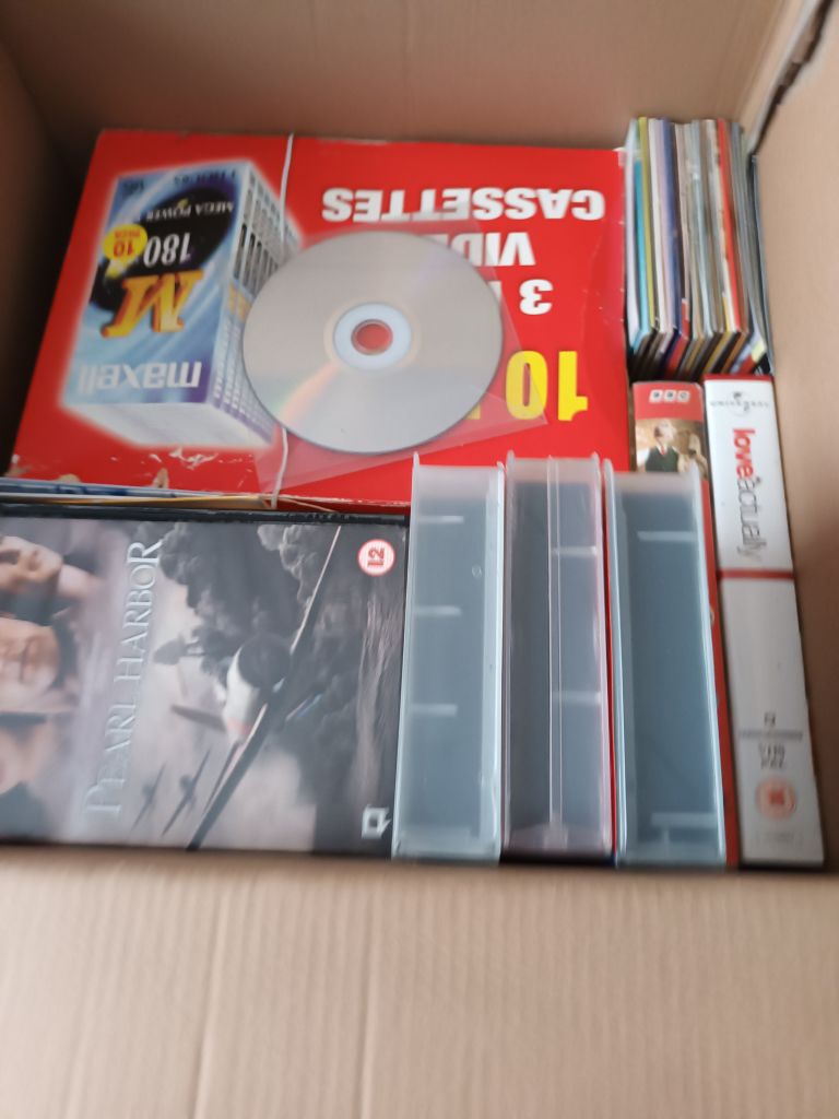 Assorted dvds cassets and CDs
