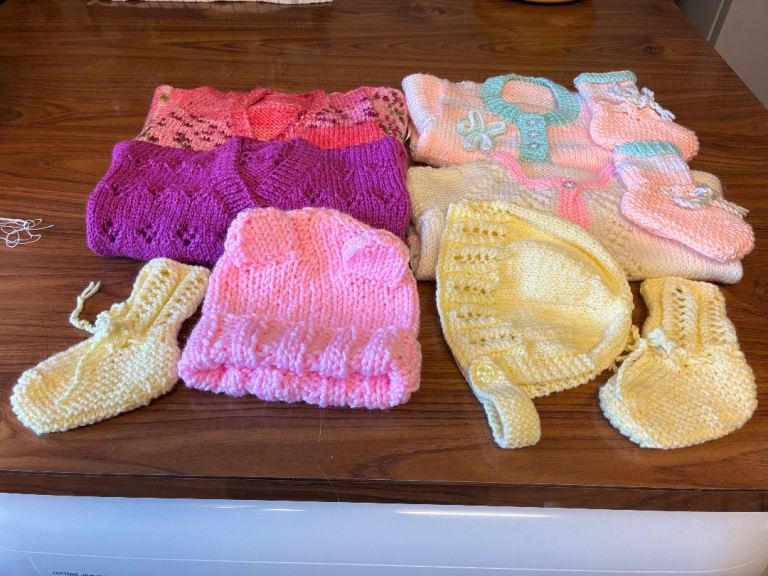 New hand knitted baby clothes