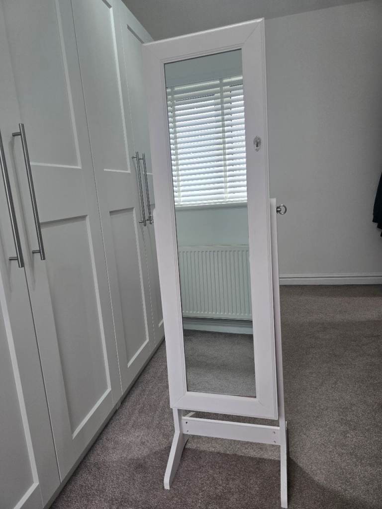 Free standing mirror with jewellary storage inside key