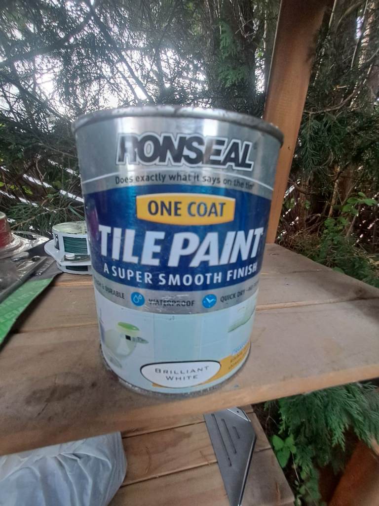 Free- 3/4 of a tin white tile paint