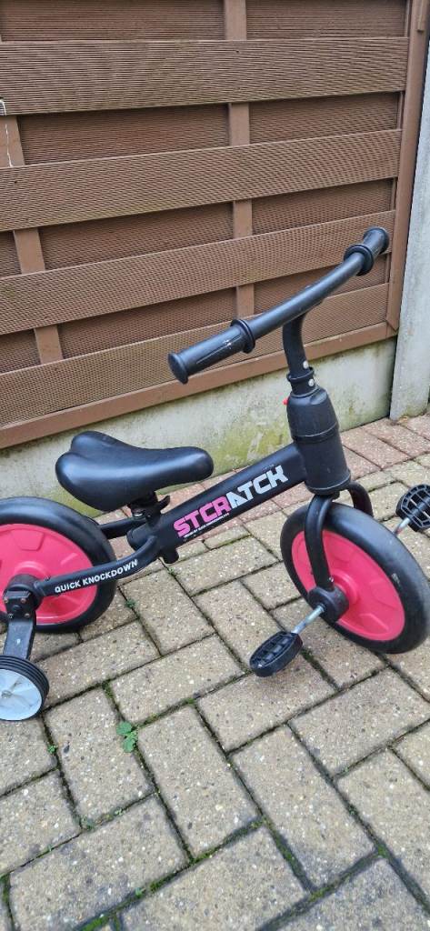 CHILDS BALANCE BIKE WITH REMOVEABLE STABILISERS. EXCELLENT CONDITION.