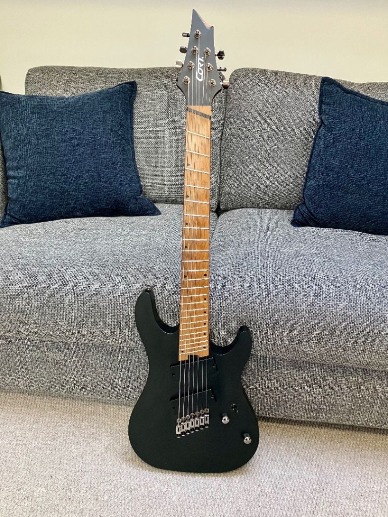 Cort 7-string KX307MS electric guitar. Multi-scale, roasted maple neck.