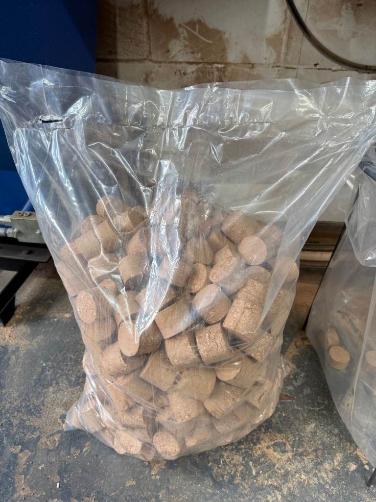 Fire wood briquettes and hard wood off cuts.