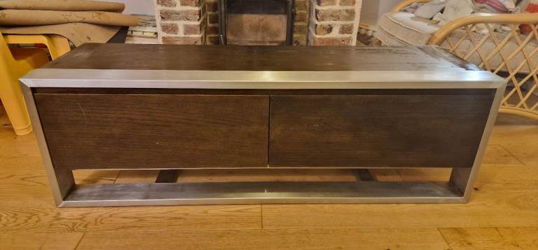 Tv unit with metal surround 