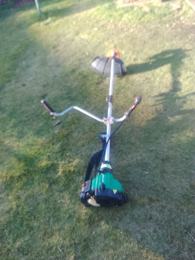 Qualcast petrol strimmer with new head