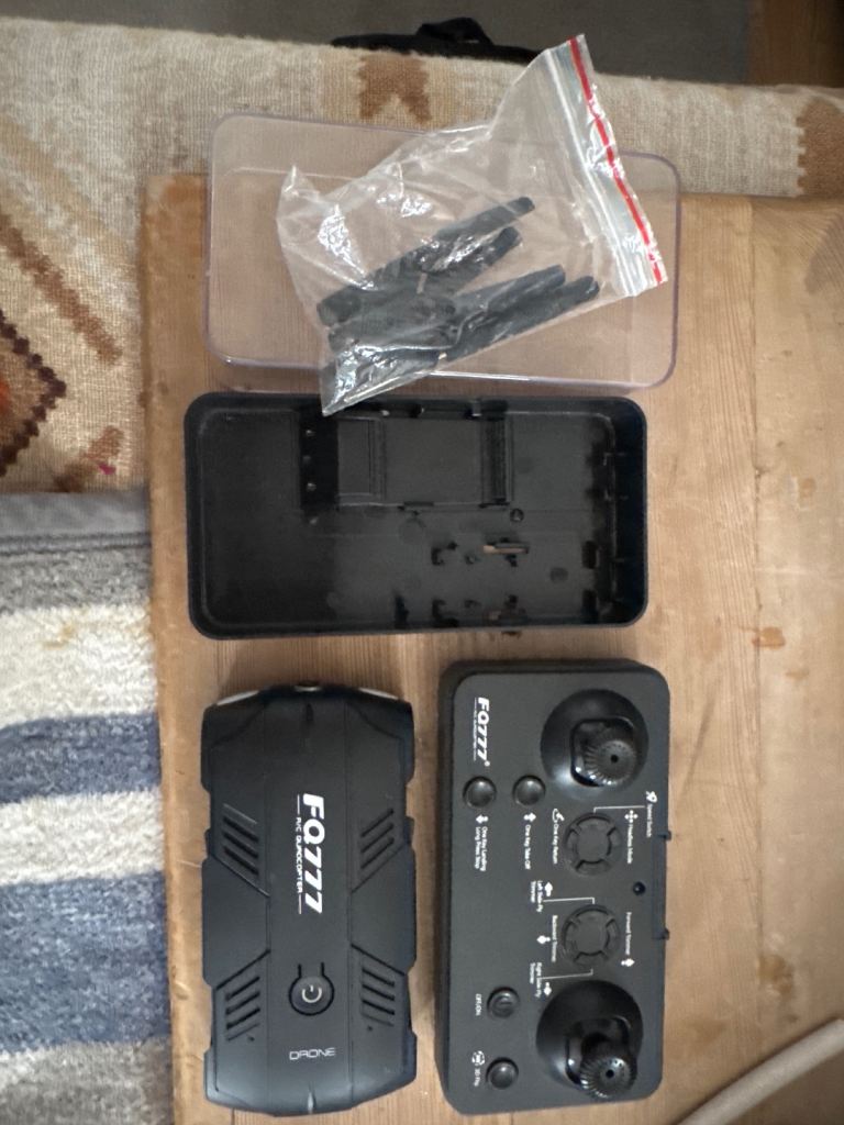 FQ777 Drone with Controller and Spare Propellers