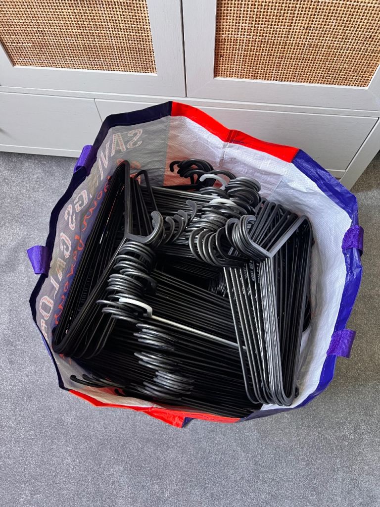 300+ plastic clothes hangers, all same size