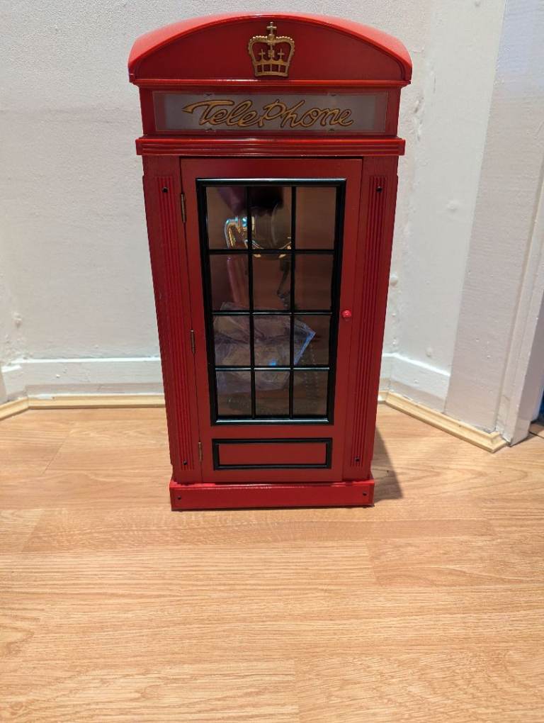 Red Steepletone landline Telephone Box
