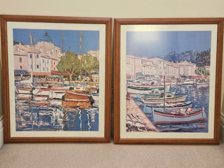 Pair of prints of boat scenes mounted in pine frames with glass - price shown is for the pair