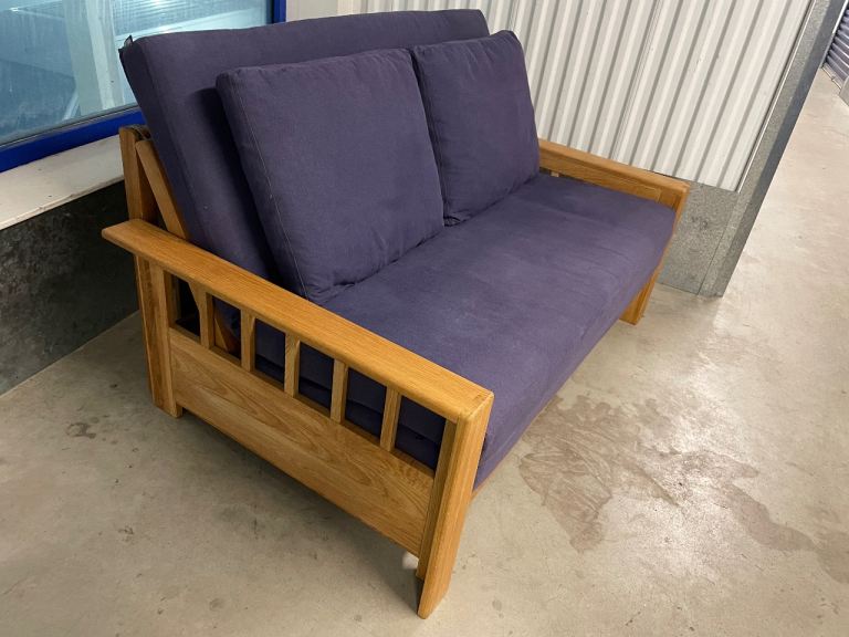 Futon Company solid oak two seater sofa bed Vienna model showroom Free Easter delivery 