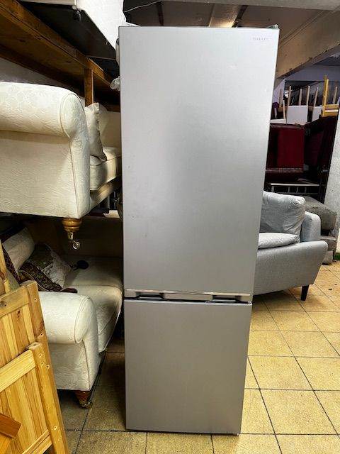 SLIMLINE FROST FREE SILVER SHARP FRIDGE FREEZER IN GOOD WORKING CONDITION