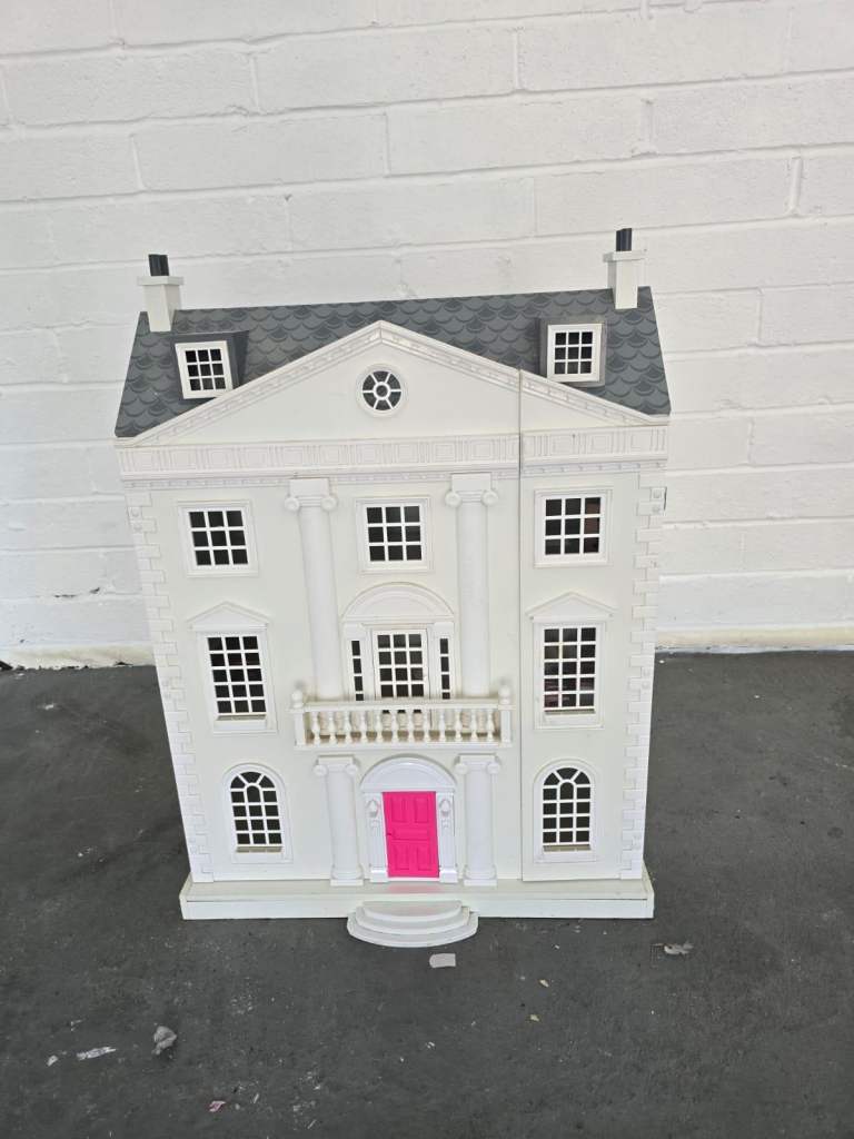 Dolls house with some furniture