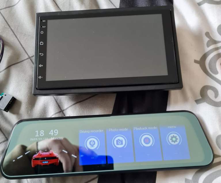 Multi media touch screen head unit with front and rear cameras