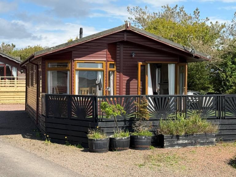 STUNNING LEGACY LODGE AT BRIGHOUSE BAY WITH HUGE DECKING AND BREATHTAKING SEA VI