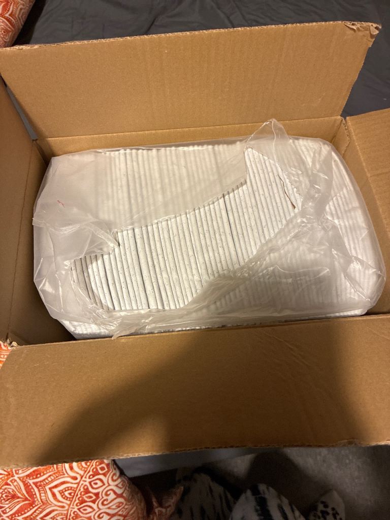 Almost full box of puppy pads