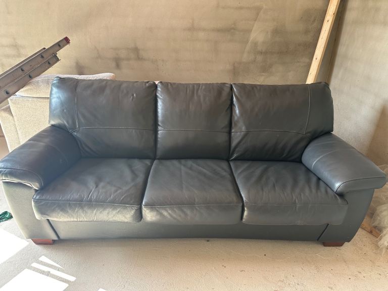 Leather sofa bed and reclining arm chair 