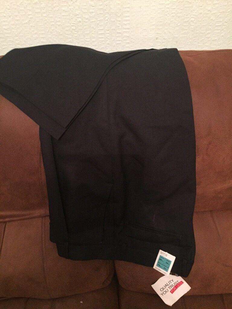 BRAND NEW M&S Mens Polyester Trousers.  34 ins. Waist, 31 ins. Leg.  Colour Navy.   £3.