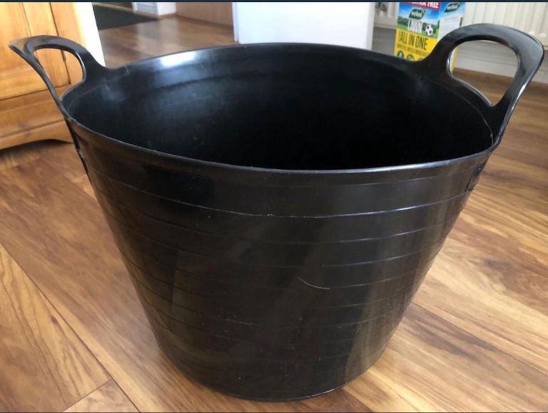 2 black storage tubs