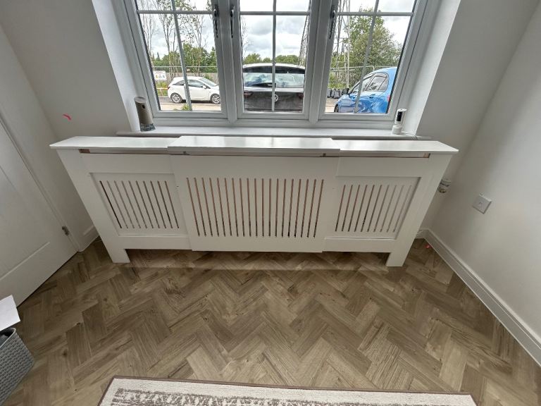 Extendable radiator cover 