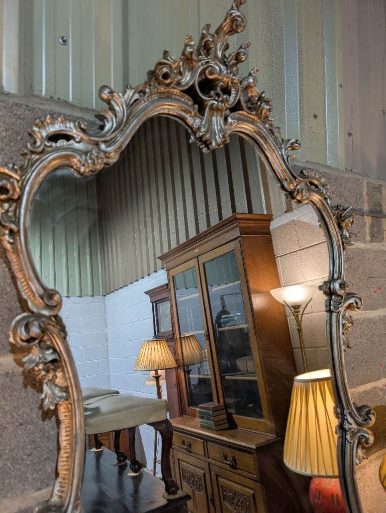 Large French rococo style silver gilt mirror