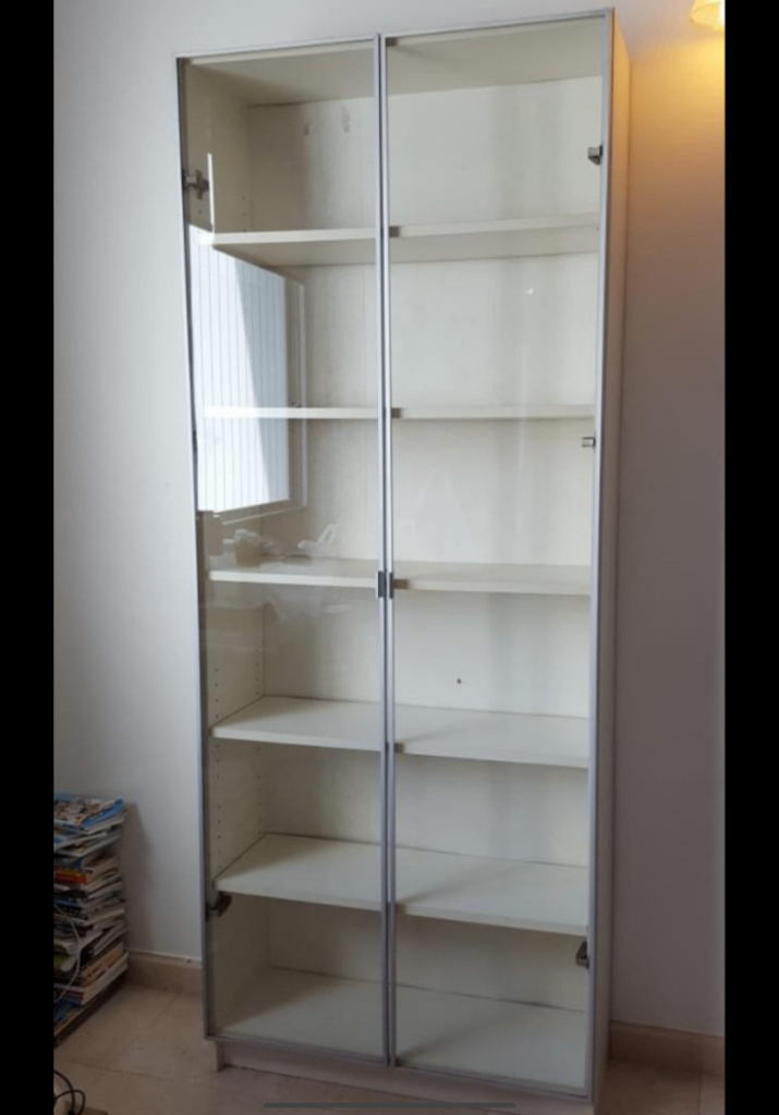 IKEA bookcase with clear glass doors