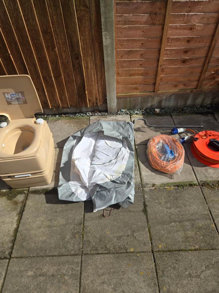 2 caravan mains leads and winder for corner steadies