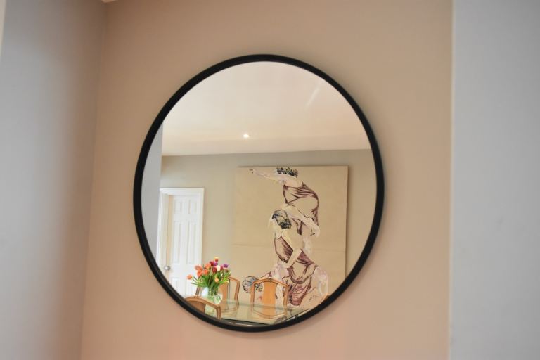 Large round mirror 90cm with black rubber surround