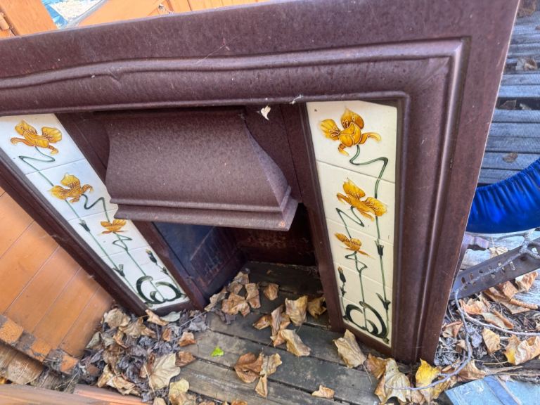 Vintage Cast Iron Fireplace with Tiled Surround