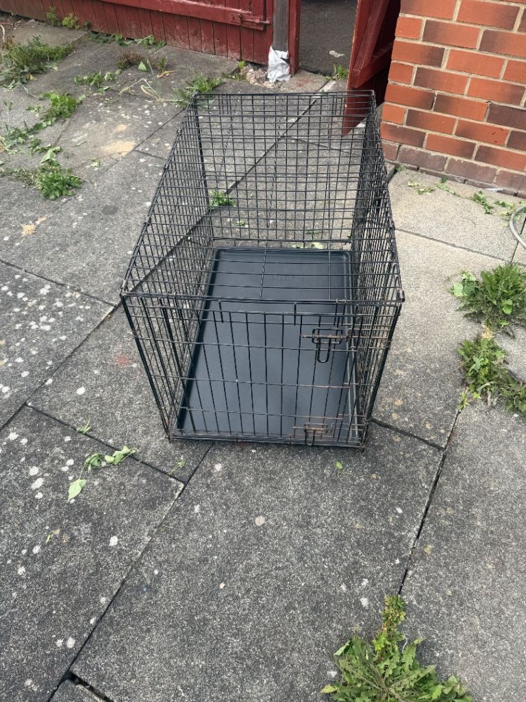 Quick sale large dog crate for sale @35