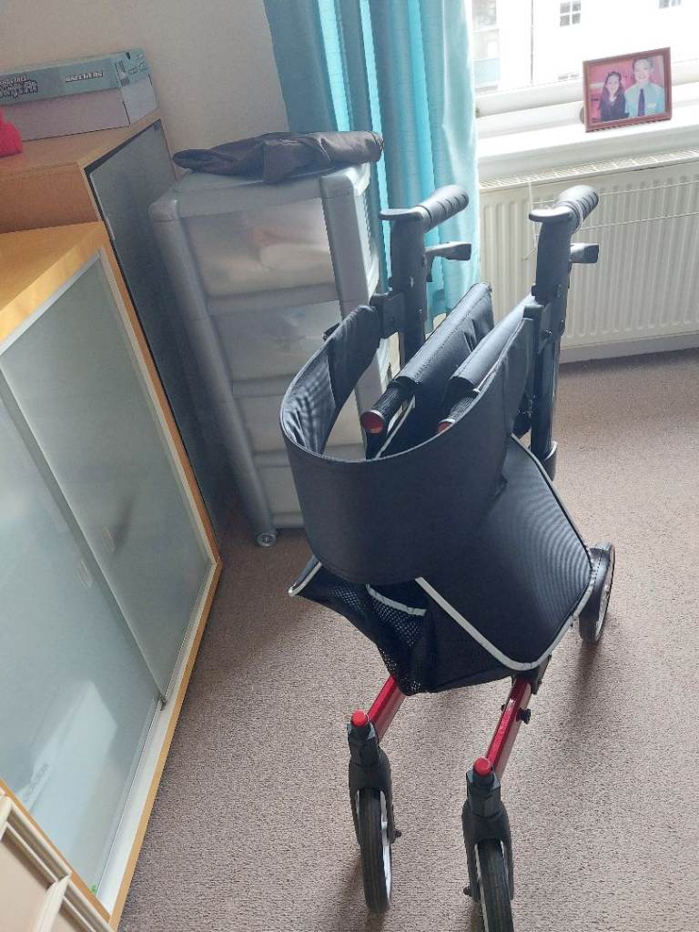 Red Foldable Mobility Walker with Seat and Storage