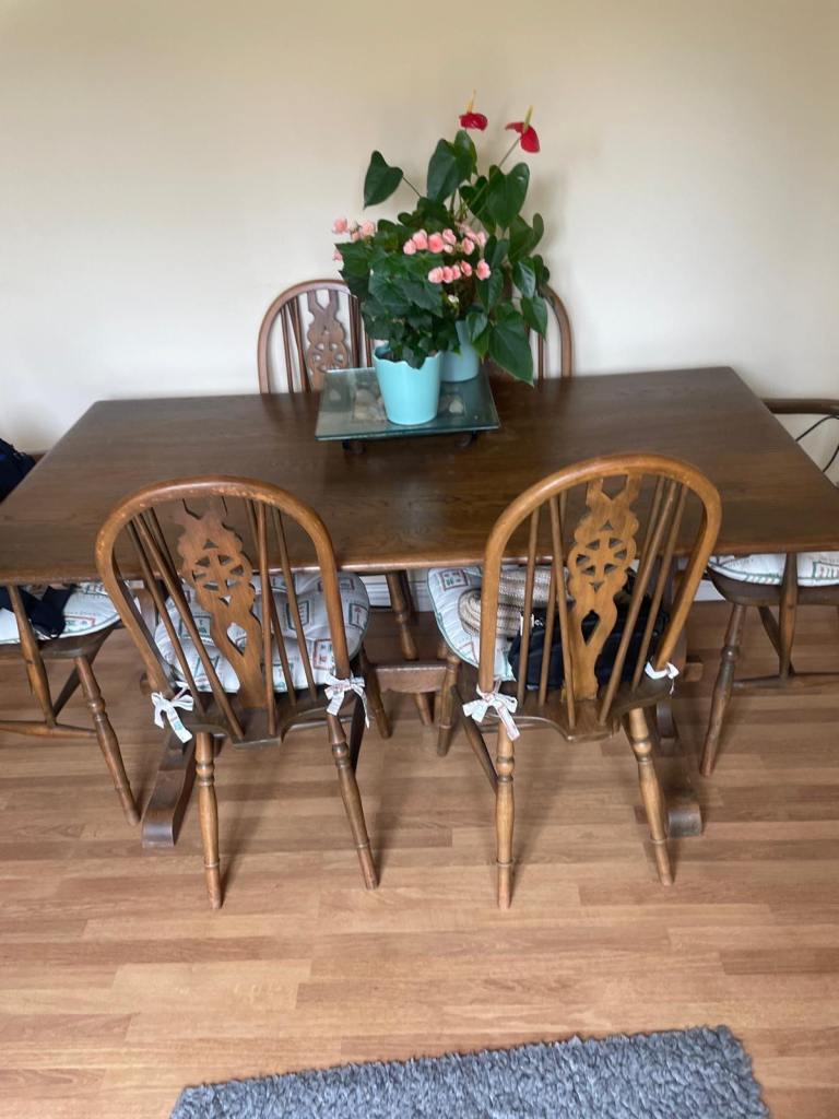 Old charm solid oak table sits 6+6 chairs. Two with arms collection only ! - good condition . 