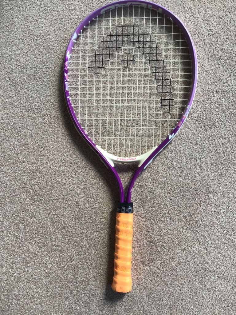 TENNIS RACKET-HEAD JUNIOR RACKET IN GOOD CONDITION- POST OR COLLECT WEYBRIDGE SURREY