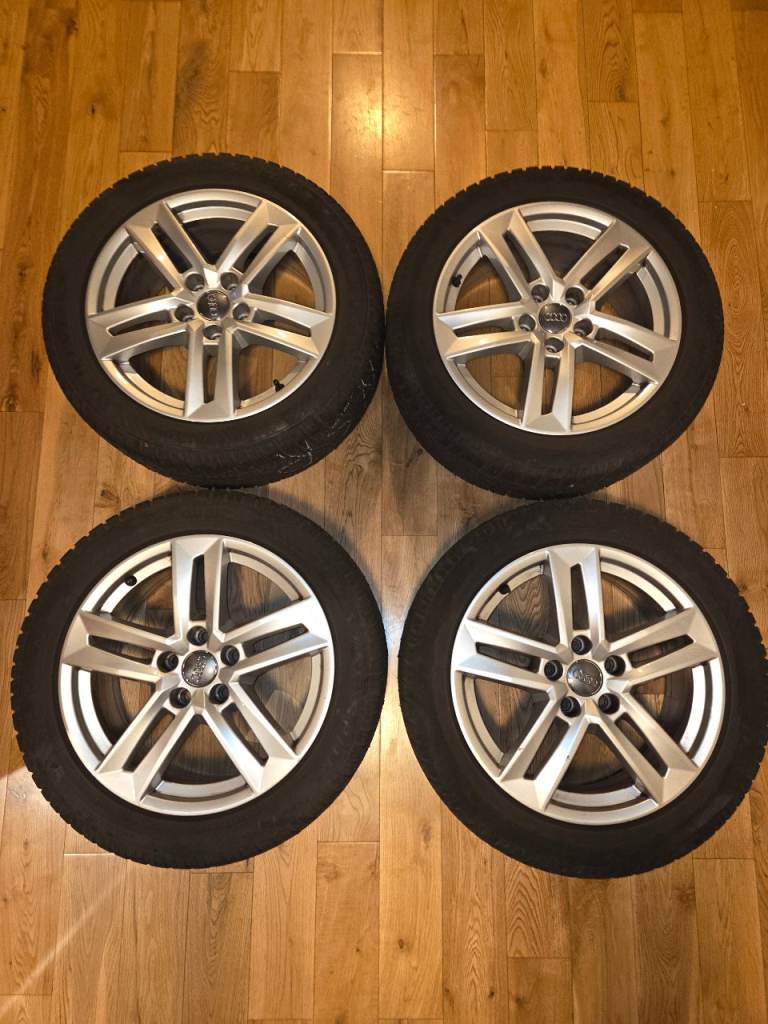 A set of original Audi 4 alloy wheels