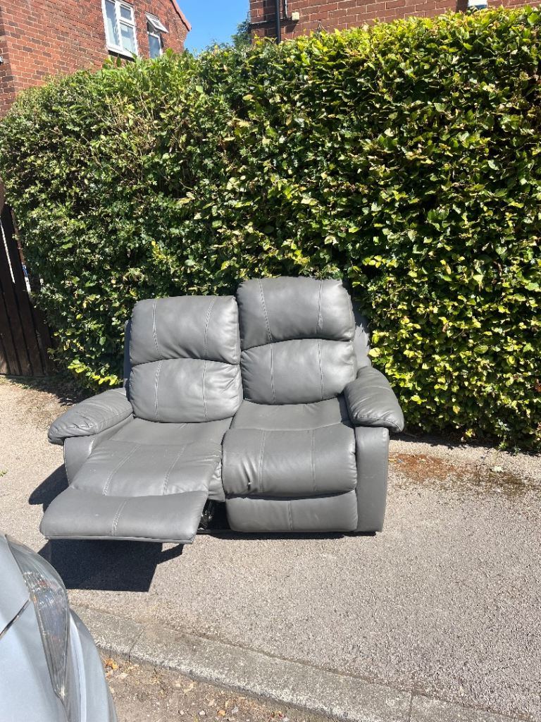 Grey Leather Two-Seater Recliner Sofa – Good Condition