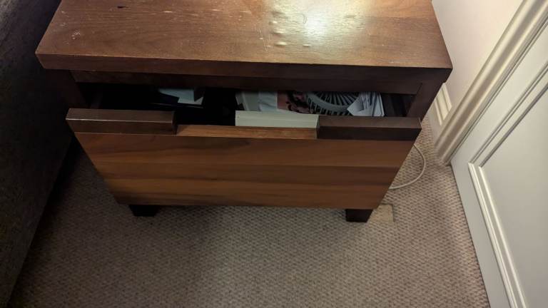 TWO matching bedside tables. Solid wood