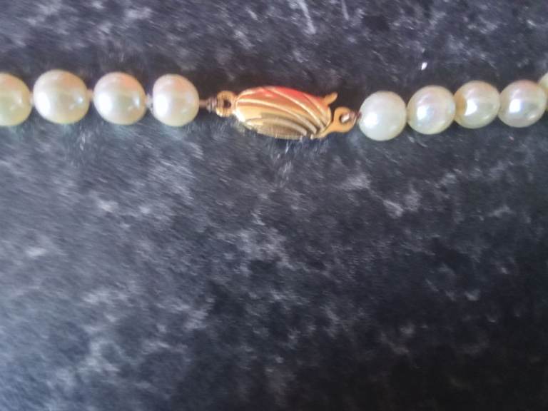 String of Cultured pearls with 9ct clasp and other with silver clasp