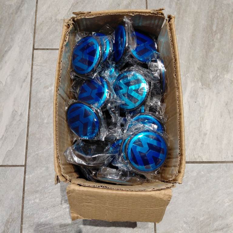 Box of Volkswagen Wheel Caps 65mm